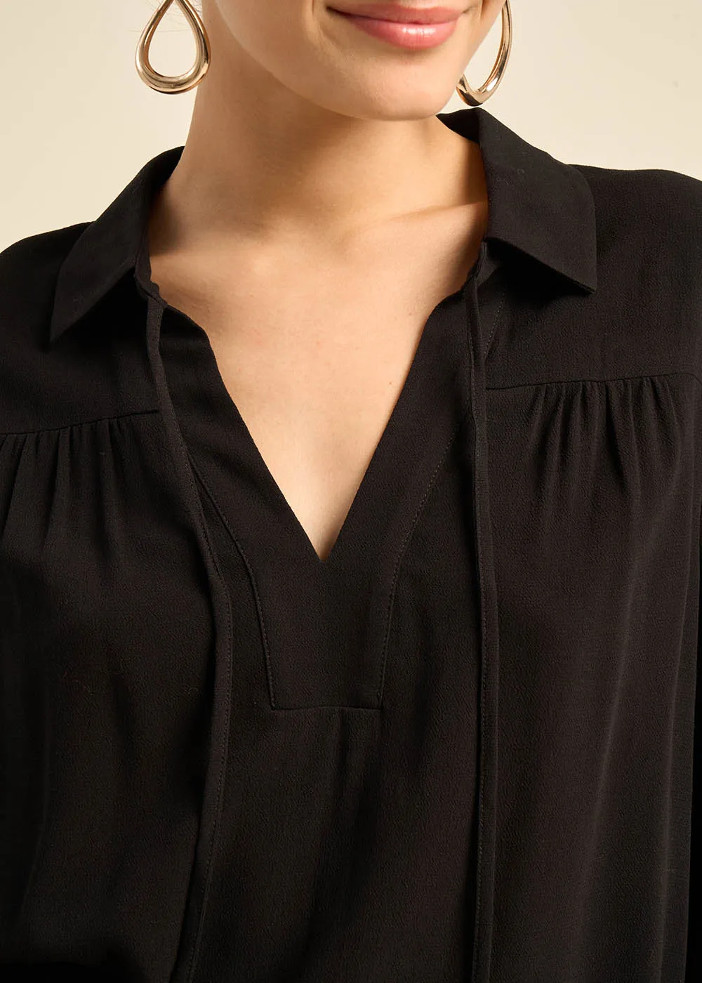 Blouse à manches bouffantes